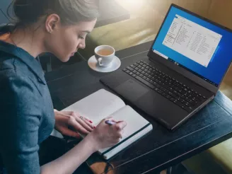 A woman working on a laptop
