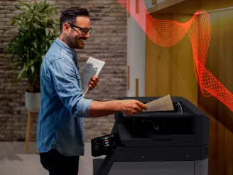 Man using Sharp A3 MFP